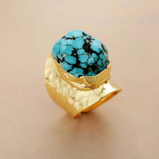Natural turquoise in a Triballe ring