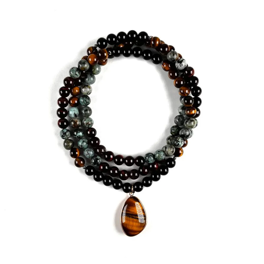 Collar de Intención Ónix y Turquesa Africana con Dije Ojo de Tigre