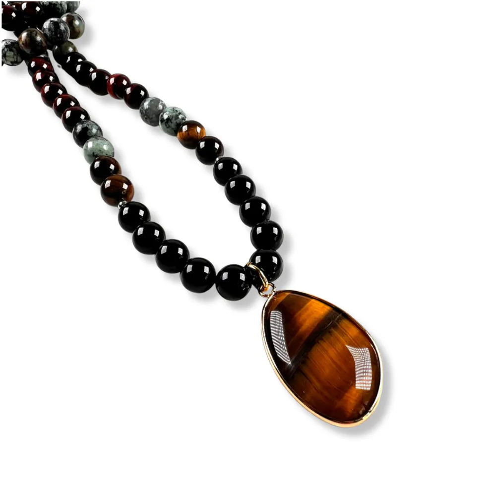 Collar de Intención Ónix y Turquesa Africana con Dije Ojo de Tigre